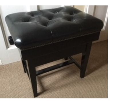 Piano Stool A John Austin adjustable piano stool with button leather top.