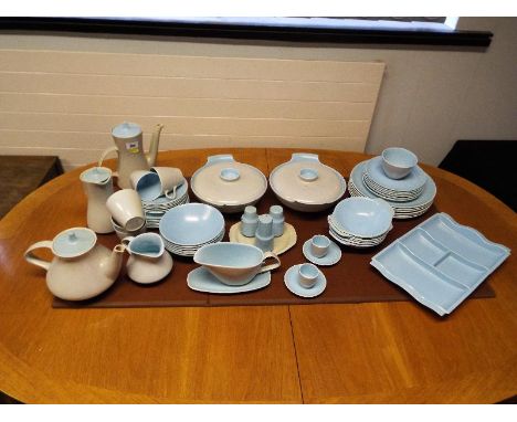 A collection of approximately 64 pieces of ceramic tableware by Poole pottery decorated in a sky blue and grey ground (qty)