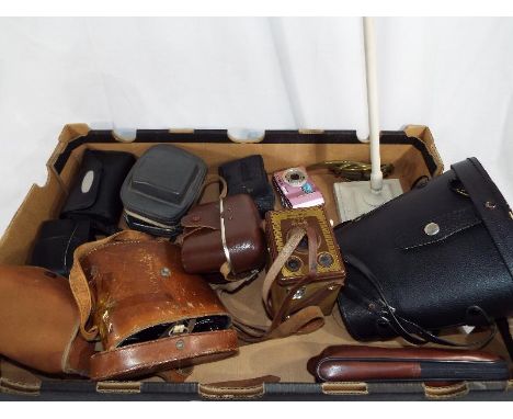 A good mixed lot of predominantly cameras and binoculars to include Miranda 16 x 50 gold coated binoculars with protective ca