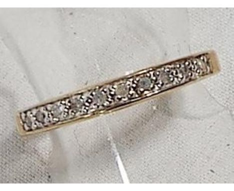 A lady's 9 carat gold half eternity ring set with 10 pt diamonds, size O, approx weight 1.7 gm - Est £40 - £50