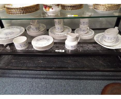 A collection of approximately 41 pieces of ceramic tableware by Royal Doulton decorated in the Galaxy pattern (qty)