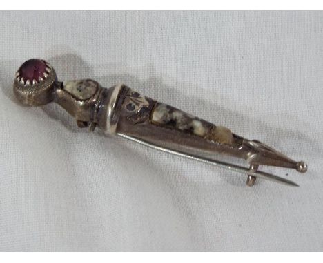 A hallmarked silver bar brooch set with natural stone and amethyst