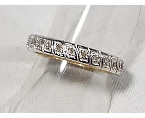 A lady's 9 carat yellow gold full eternity ring set with .15 pt diamonds, size O, approx weight 2.4 gm - Est £40 - £50
