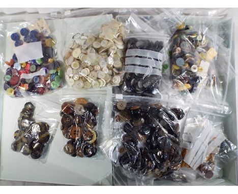 A huge collection of sorted vintage buttons to include wooden, early Bakelite and similar
