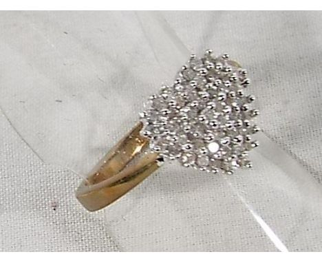 A lady's 9 carat gold 25 pt 1/4 ct diamond cluster ring, approx weight 3.0 gm (all in) size L + 1/2 - Est £60 - £90