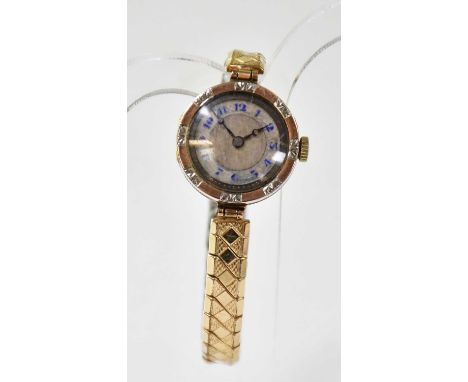 Two ladies' 9ct gold watches, the smaller example has dial set with blue Arabic numerals, patterned bezel, crown wind movemen
