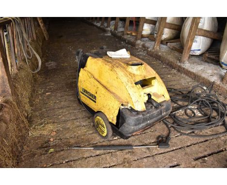 Various workshop tools comprising a Karcher portable power wash with long hose, a three-phase electric welder and Ajax Precis