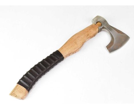 RAVEN FORGE; a bevelled hatchet axe with leather-bound grip and sheath, length 51cm.Condition Report: - Please note that this