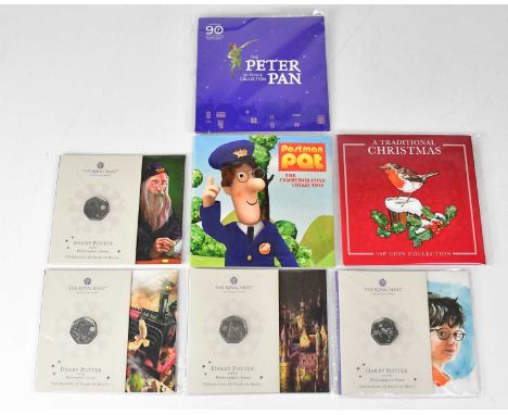 THE ROYAL MINT; four Harry Potter and the Philosopher's Stone 25 Years of Magic commemorative fifty pence coin packs, two Wes