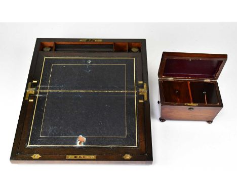 A Victorian brass bound walnut writing slope with vacant brass cartouche, enclosing a blue tooled leather slope and two glass