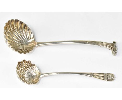 A Victorian hallmarked silver ladle with shell-shaped bowl, Josiah Williams &amp; Co, London 1899 and a Victorian hallmarked 