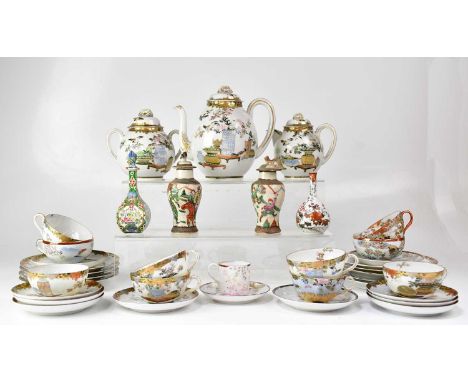 A Japanese eggshell tea service, together with other Japanese eggshell cups, saucers and vases.Condition Report: Lot comprise