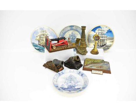 Various maritime collectibles comprising a spelter ornament depicting lighthouse with sailboat to the front, height 22cm, a m