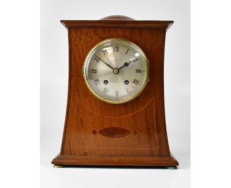 An Edwardian mahogany mantel clock, the silvered dial set with Roman numerals, the movement stamped 'Coventry Kestrel 3112', 