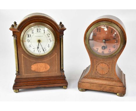 An Edwardian inlaid mahogany balloon-shaped mantel clock, the dial set with Arabic numerals, height 22cm, together with an Ed