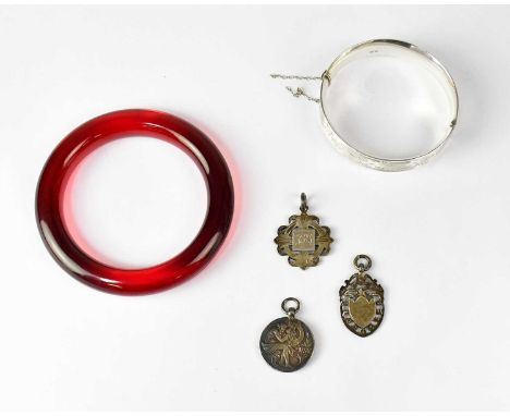 A hallmarked silver hinged bracelet with floral decoration, hinge to clasp 6.5cm, three hallmarked silver prize fobs, combine