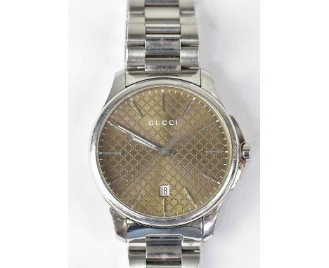 GUCCI; a gentlemen's G-Timeless brown dial quartz wristwatch, the dial set with batons and date aperture, diameter of case ex