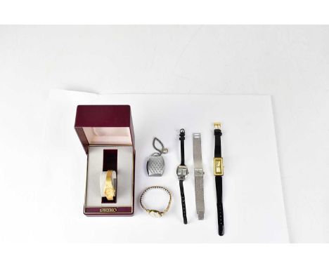 Six ladies' watches comprising a gold-plated dainty cased Seiko with textured strap, a 1970s stainless steel Rotary watch wit