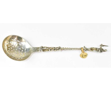 WILLIAM EDWARDS; a Victorian hallmarked silver sifting spoon with finial modelled as Justice, London 1874, approx. 1.39ozt.