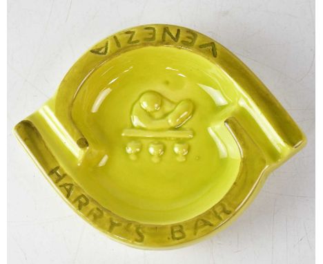 A Harry's Bar, Venetzia ceramic ashtray by Guiseppe Cipriani Snr, in lime green, with signature to base, width 17cm.Condition