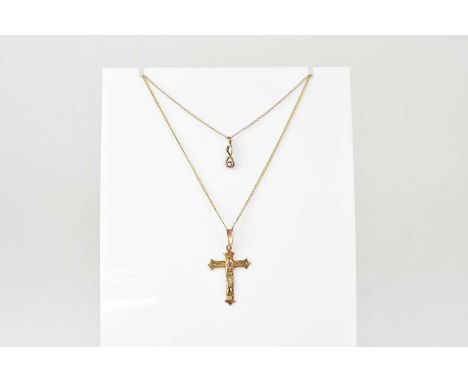 A 9ct gold cross pendant, length 3.2cm, on a 9ct gold dainty chain, length 44cm, together with a small 9ct gold Celtic-style 