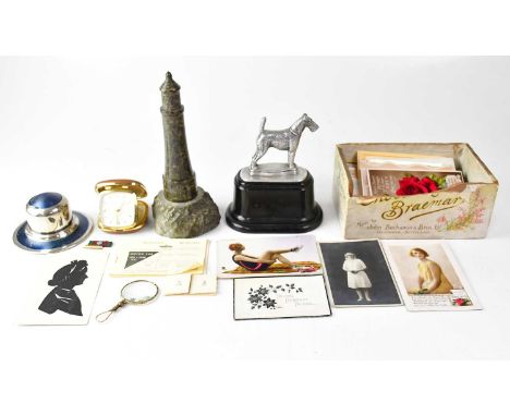 A group of collectors' items comprising a Cornish polished marble lighthouse, height 23cm, an Art Deco capstan-style desk ink