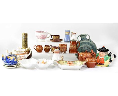 A collection of 18th, 19th and 20th century pottery and porcelain to include an English Majolica fish swallowing fish teapot,