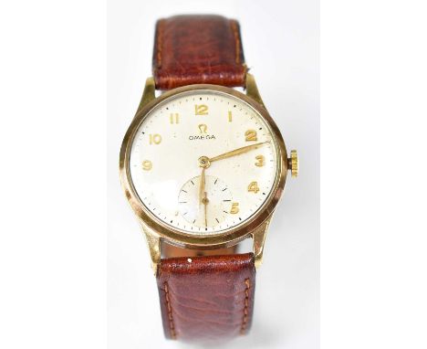 OMEGA; a 9ct gold cased gentlemen's manual wind wristwatch, the silvered dial set with Arabic numerals and subsidiary second 