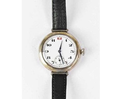 LONGINES; a hallmarked silver cased manual wind gentlemen's wristwatch, the white enamelled dial set with Arabic numerals and