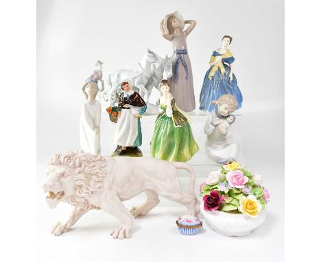 ROYAL DOULTON; three figures of ladies comprising HN1991 ‘Country Lass’, HN2368 ‘Fleur’, and HN2304 ‘Adrienne’, together with