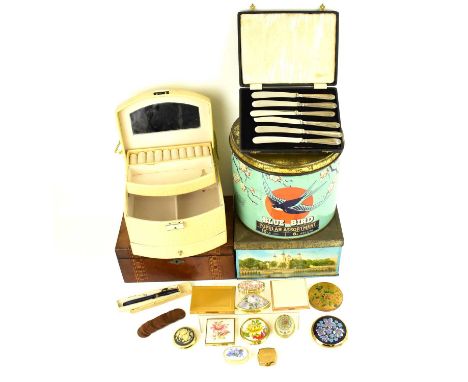 A group of mixed collectors' items comprising a cased set of filled silver handled butter knives, compacts, trinket boxes, a 