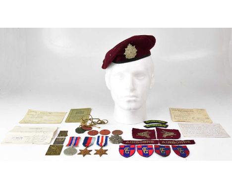 A collection of WWII militaria items, comprising two British Army 1st &amp; 6th Airborne Pegasus shoulder patch cloth badges,