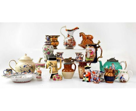 A collection of various, mainly 19th century ceramics, to include ironstone jugs, silicon ware, an Austrian tankard with prin