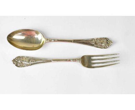 JOSIAH WILLIAMS &amp; CO; a Victorian hallmarked silver spoon and matching fork, both inscribed 'EJ' to the handle, London 19