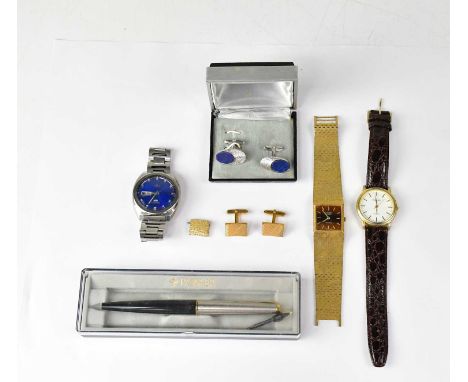 Three gentlemen's wristwatches including a Seiko stainless steel automatic, the blue dial set with day/date aperture, a Noves