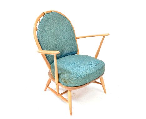 ERCOL; a 1970s stick-back open arm elbow chair on slender tapering legs, height 81cm, with Ercol sticker.Condition Report: In
