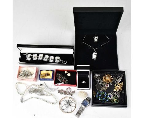 A collection of costume jewellery to include a silver ring set with solitaire cubic zirconia, a Rotary wristwatch, brooches, 