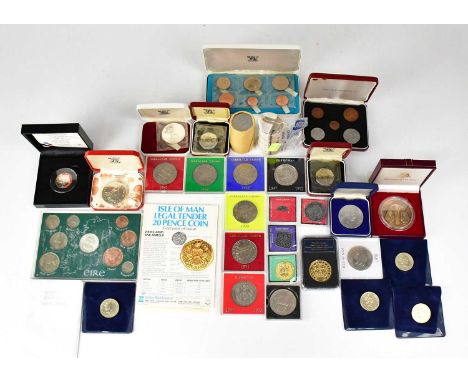 A quantity of miscellaneous coin sets, packs and individual coins, to include three Isle of Man twenty pence coins 1982 first