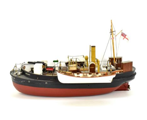 BRITANNIA; a model of an exposive carrier with single funnel engine and mast, two row boats each with seperate canons on winc