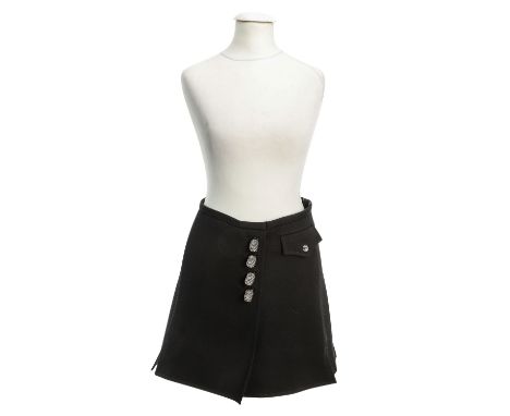 LOUIS VUITTON Rock, Gr.: 34. Modell in Schwarz aus Wolle, Innenfutter aus Seide. Dekorativer Verschluss und aufgesetzte Patte