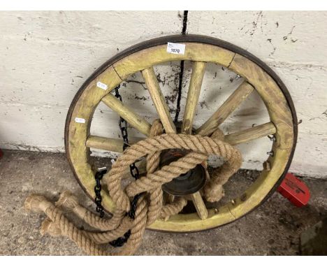 A wood and metal vintage cartwheel