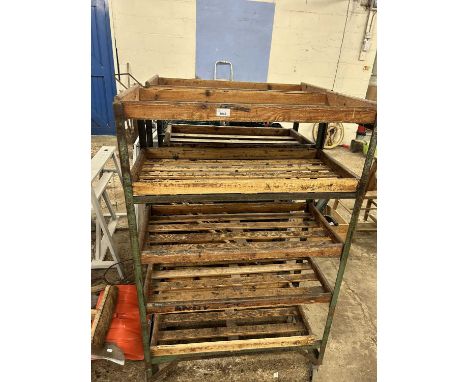 Two vintage workshop storage racks on casters