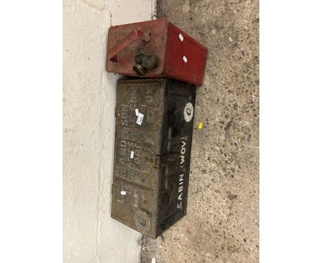 Vintage tin together with a metal fuel can