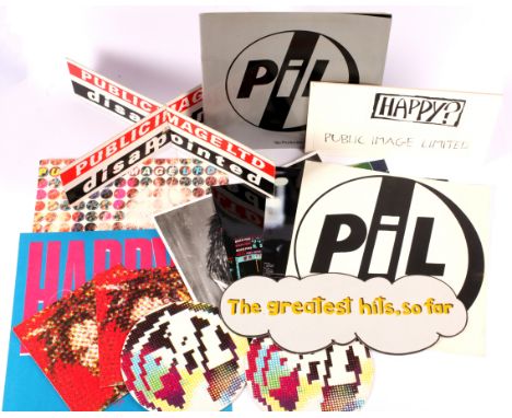 Assorted Public Image Limited Memorabilia. Includes: 2 x sets of PIL pin badges with original packaging, various A4 size pres