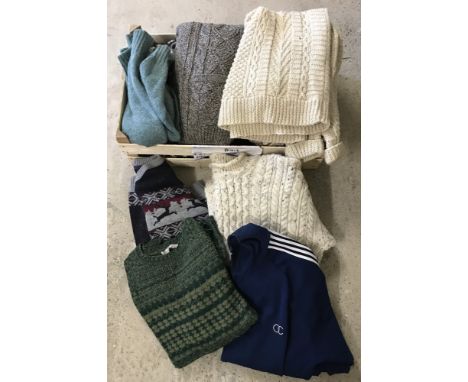 A box of assorted men's vintage knitwear, some still with original tags. To include Jaeger. 