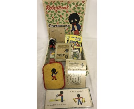 A box of assorted Golly ephemera and misc items in a vintage Robertson's Christmas Hamper. To include Noddy jigsaw, Golly han