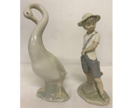 2 unboxed Nao figurines - A boy and a swan.  