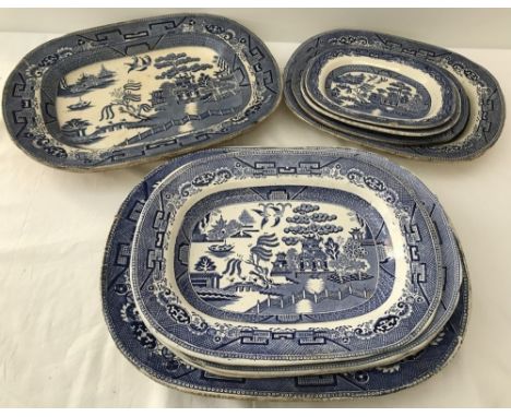 9 ceramic blue and white willow pattern meat platters / serving dishes of various sizes. To include H.A &amp; Co. Some a/f. L