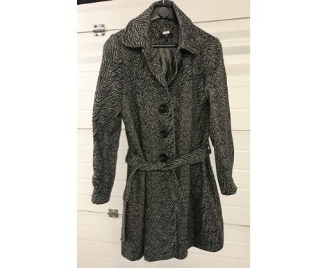 A ladies black and white animal print winter coat by Jasper Conran. With buttoned cuffs and belted waist. Size 12.