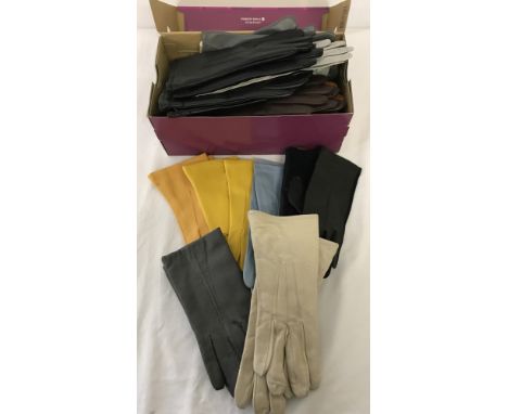 A box of assorted vintage ladies leather and synthetic gloves.  